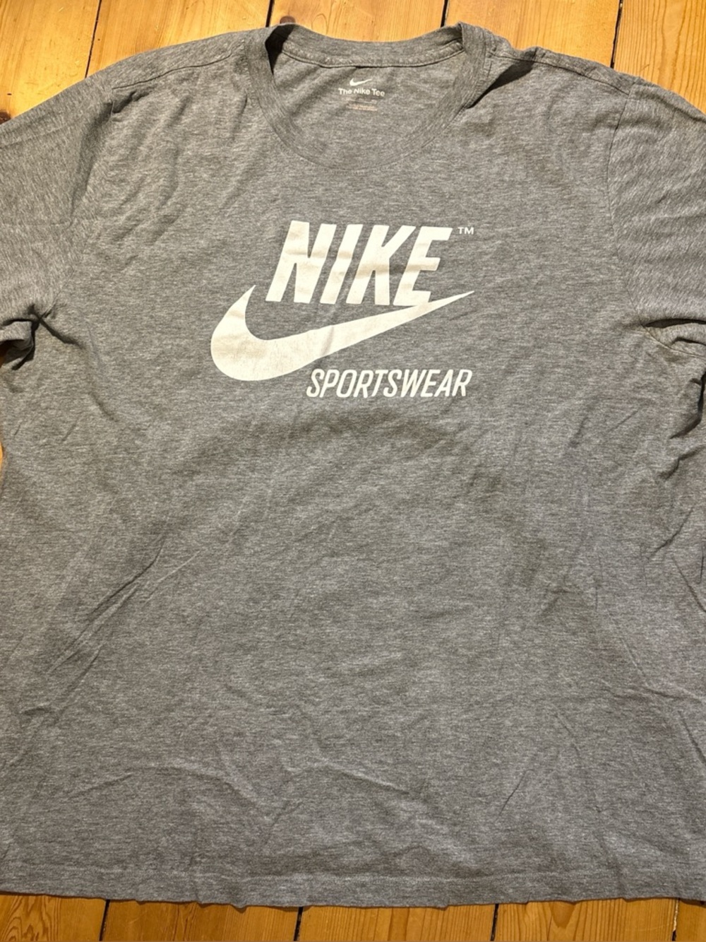 Nike Black T-Shirt with White Swoosh Logo
